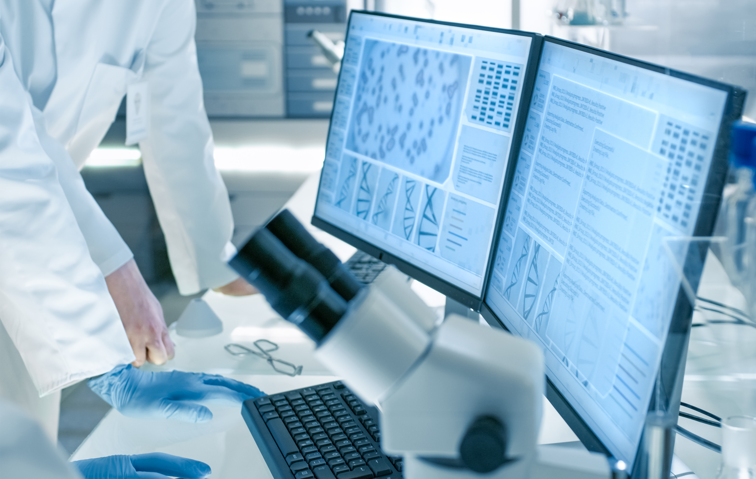 medical researchers looking at computer