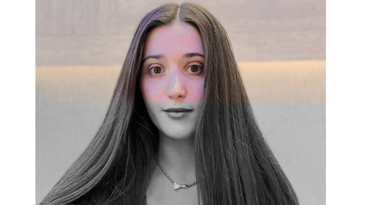 Portrait of an AWS employee with long hair, photographed in front of a neutral background. Image is used for the Bedrock homepage hero section.