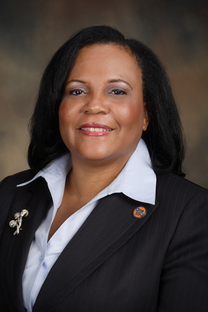 Professional portrait photograph of Dr. Mable J. Moore, dressed in business attire with a neutral background.