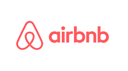 Airbnb logo with a stylized "A" symbol and the word "airbnb" in red.