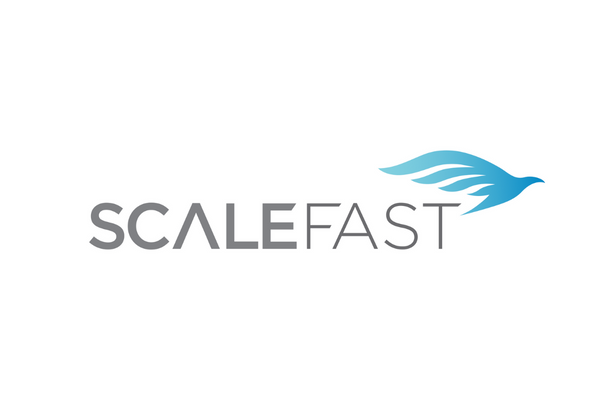 Logo for Scalefast featuring the company name in gray text and a stylized blue bird design on a white background.