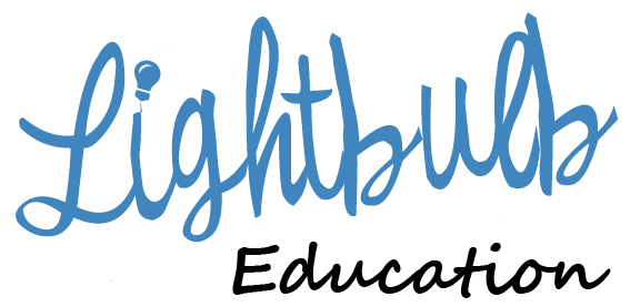 Silhouette of a mountain range against a blue sky.