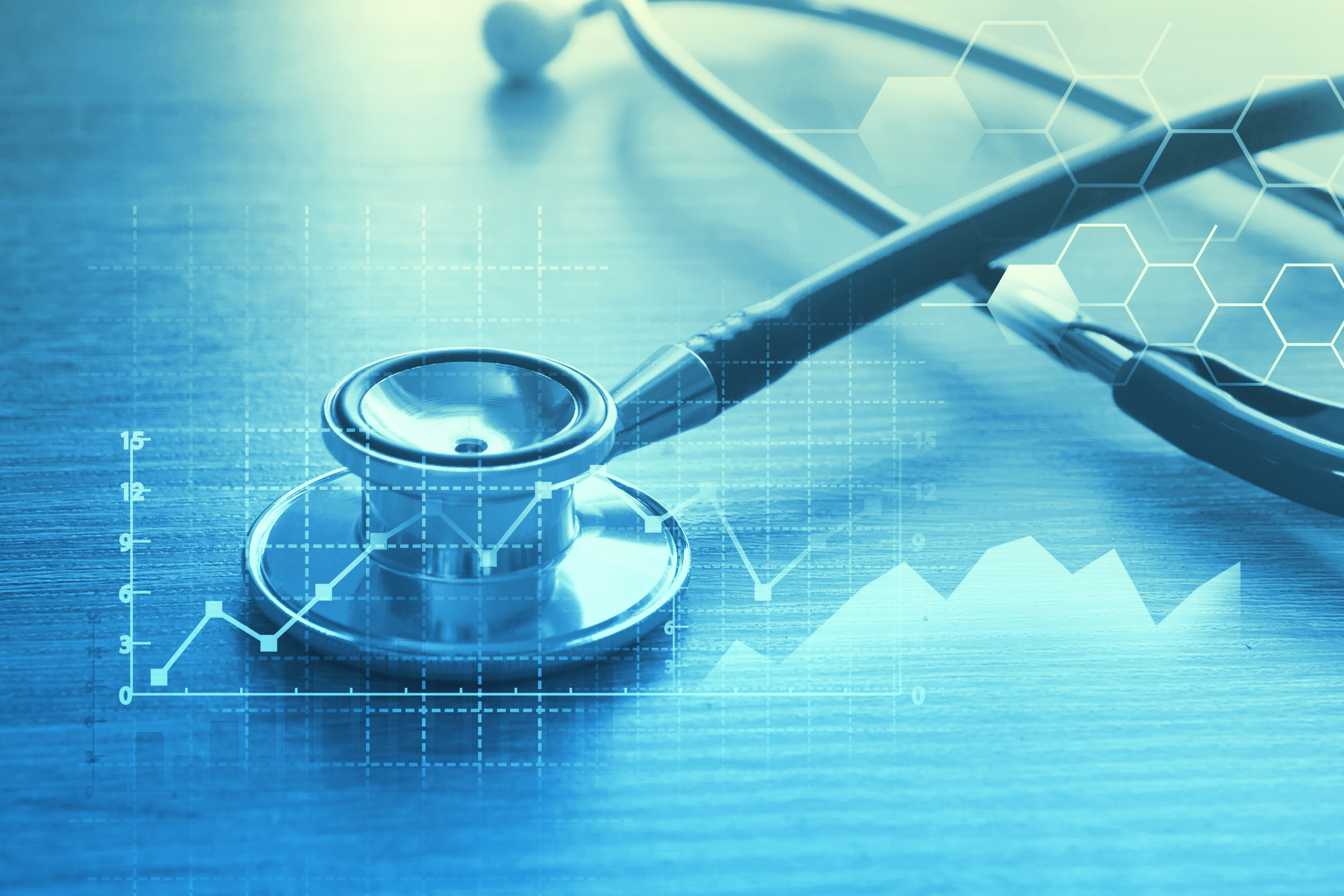 A stethoscope on a wooden surface with digital healthcare data graphics and hexagonal patterns representing medical examination and healthcare service technology.