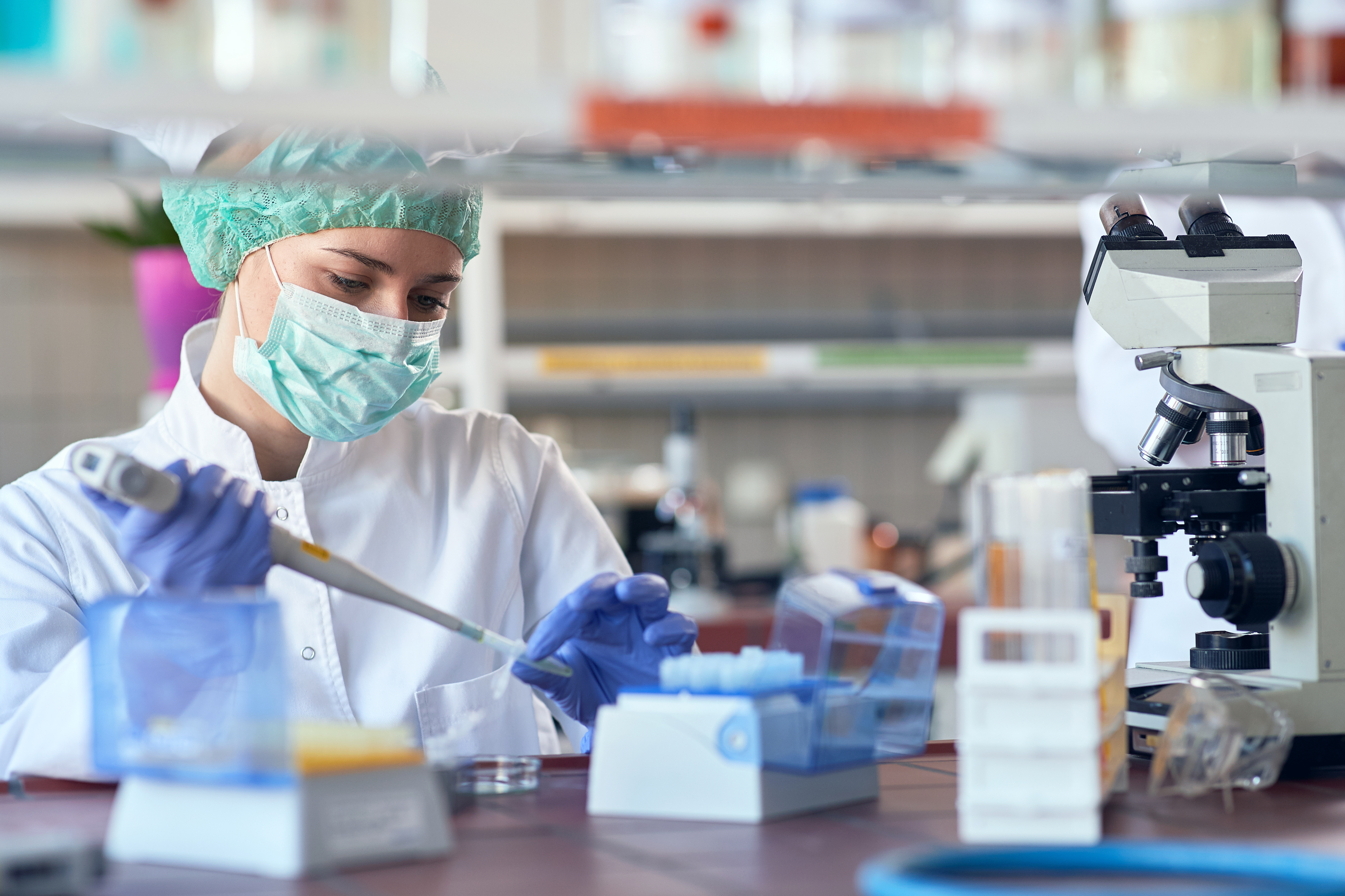 scientict in lab analysis of new corona virus, clinic laboratory chemical research of infection. Covid-19 concept.