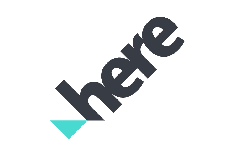 A stylized 'here' logo with diagonal text and a turquoise arrow beneath, on a white background.
